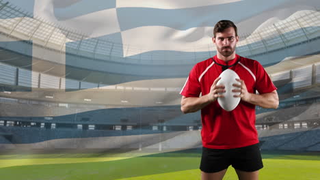 professional rugby player standing in front of a flag and stadium