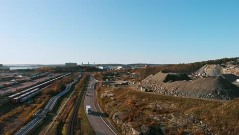 aerial drone pedestal shot of road in port of gothenburg during the day