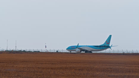 big jet plane taking off runway