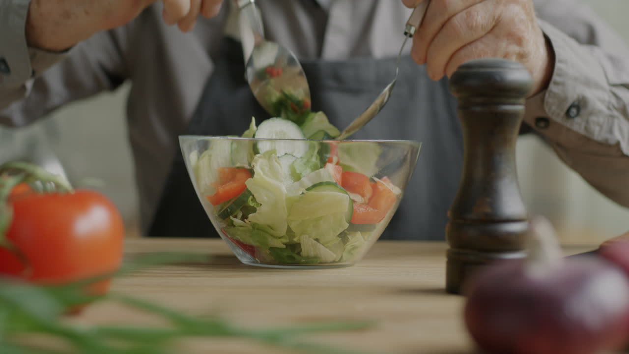 Elderly Man Eating a Salad