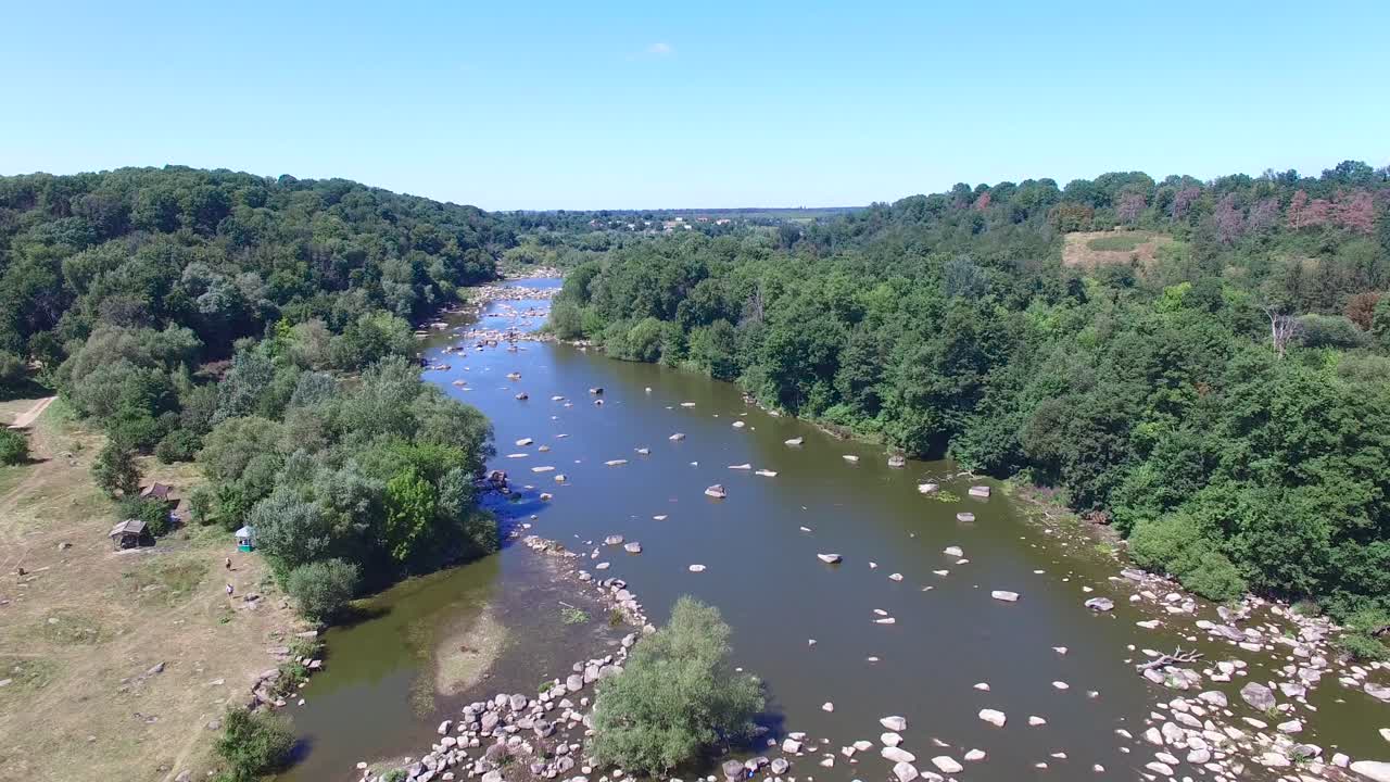 River with rapids. Aerial view of flowing river rapids