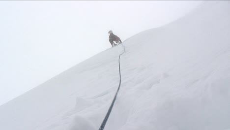 View-from-below-of-climber-up-ahead