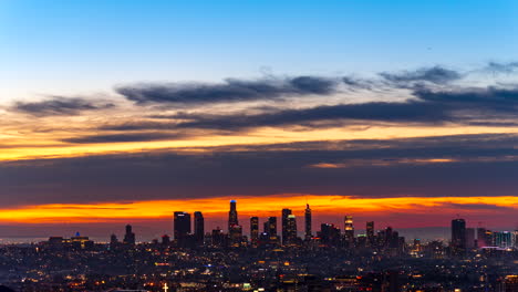 stunningly colorful sunrise over the los angeles skyline - night-to-day, holy grail, wide angle time lapse