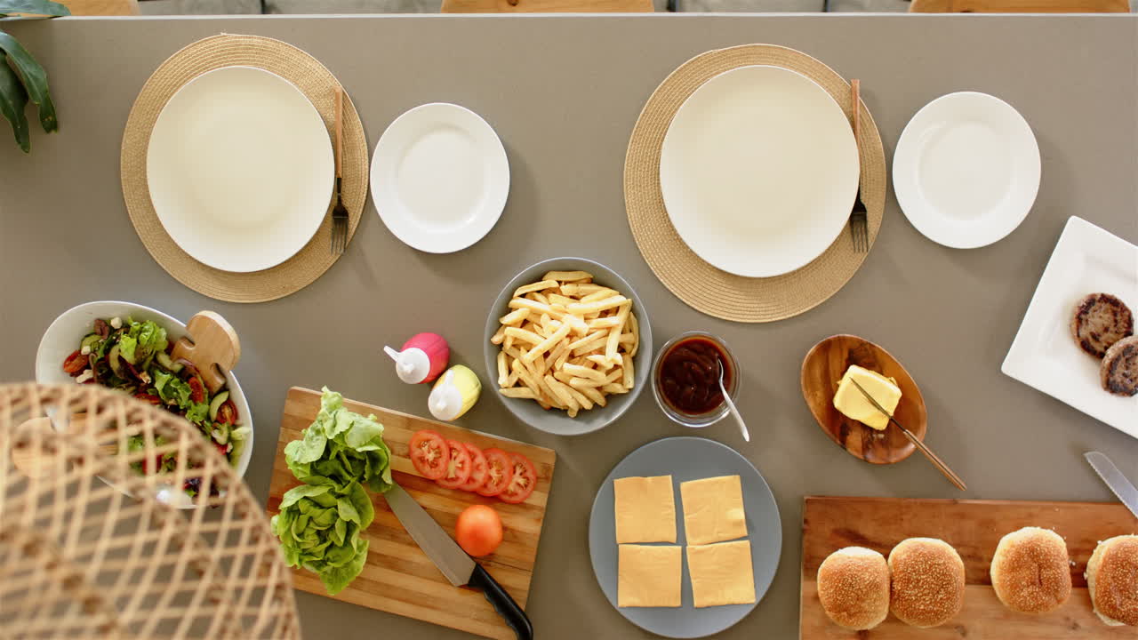 Preparing meal, various ingredients for homemade burgers on kitchen counter