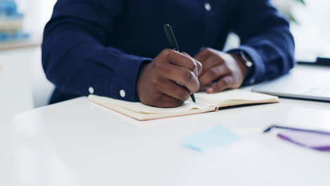 Closeup, office and hands with a notebook