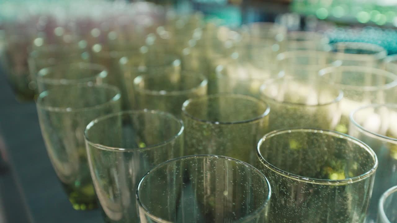 Empty Green Champagne Flutes Displayed