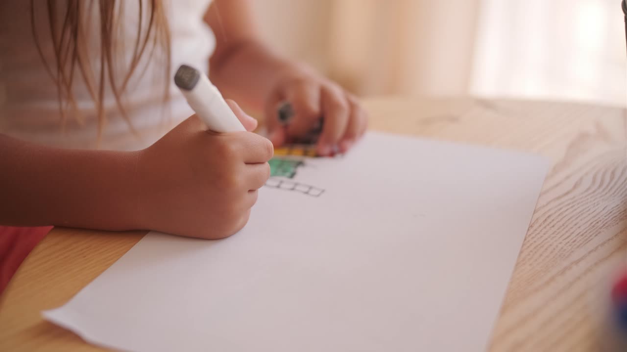Child drawing on paper