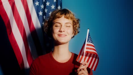 woman holding american flag