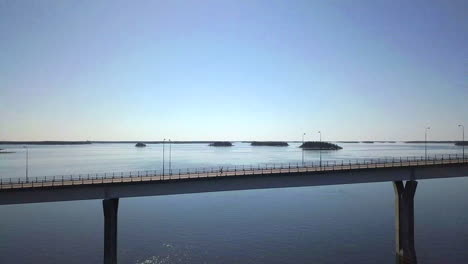 man running marathon on replot bridge, finland