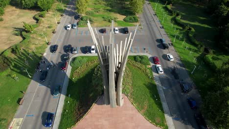 Top-Down-View-Of-The-Monument-In-Front-Of-The-House-Of-The-Free-Press-in-Bucharest,-Romania