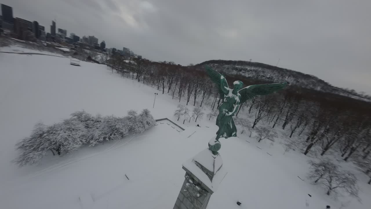 Winged Goddess Of Liberty At Sir George Etienne Cartier Monument In Mount Royal Park, Montreal, Quebec, Canada. FPV Shot