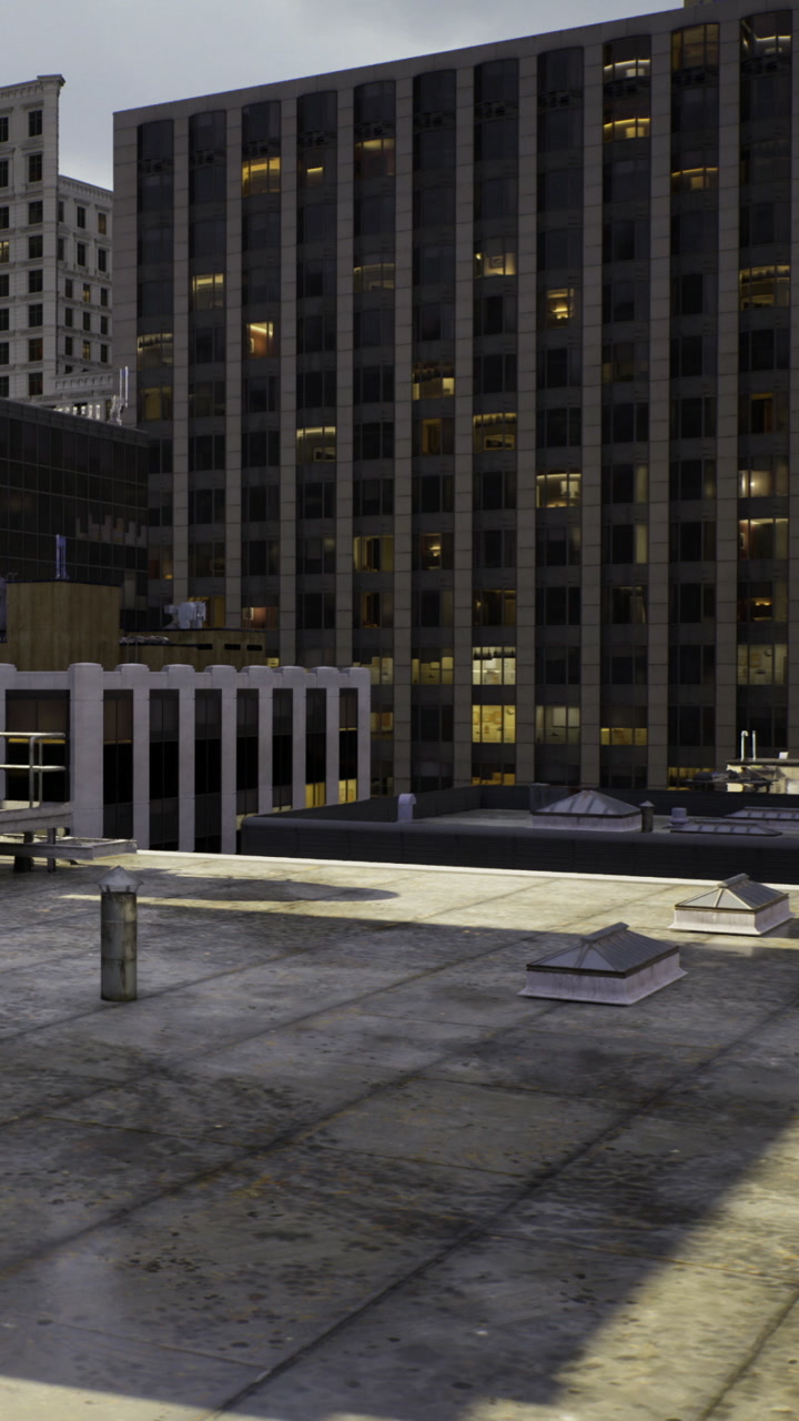 City rooftop view showing buildings and lights at dusk in urban area