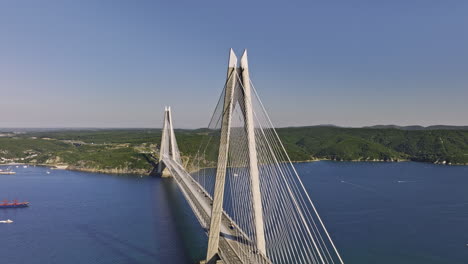 istanbul turkey aerial v89 flyover garipçe neighborhood towards bosphorus strait, fly around yavuz sultan selim bridge tower capturing cable-stayed design details - shot with mavic 3 cine - july 2022