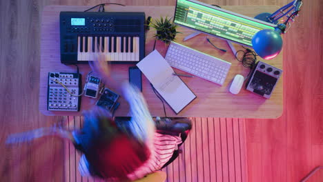musician working in home studio