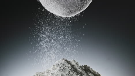 Sifting flour through sieve, slow motion