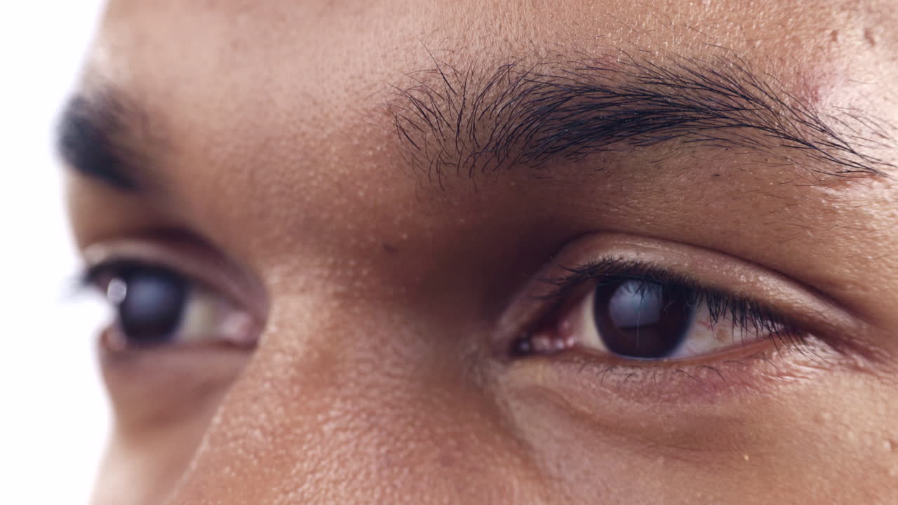 Eyes, future and mindset with a man in studio