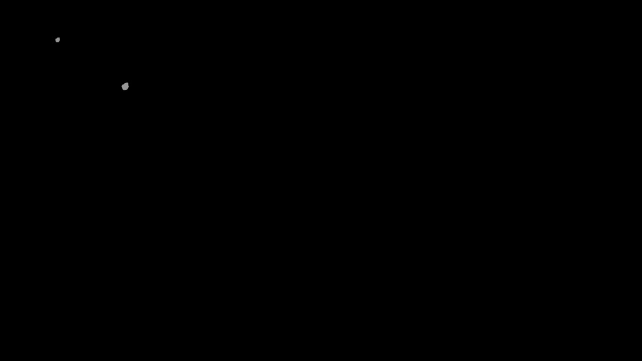 Subtle White and Grey Dust Particles Floating on Black Background