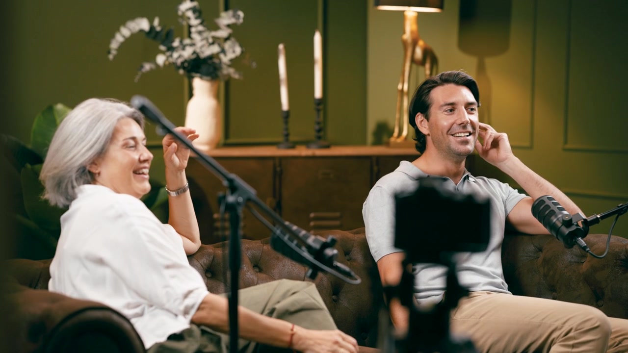 Two People Recording a Podcast Interview in a Studio