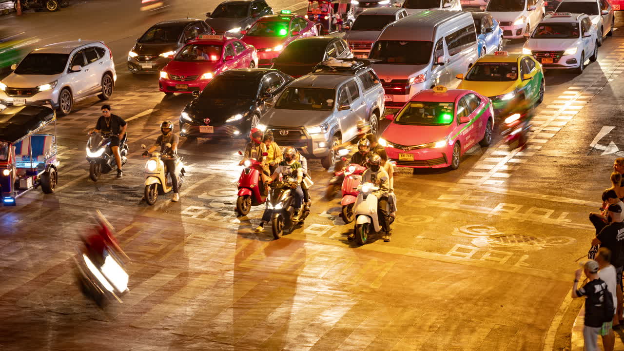 timelapse of rush hour traffic in central bangkok at night