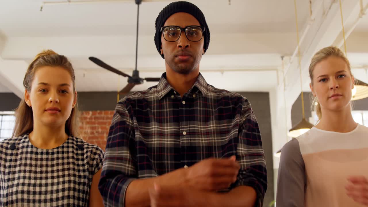 Confident executives standing with arms crossed 4k