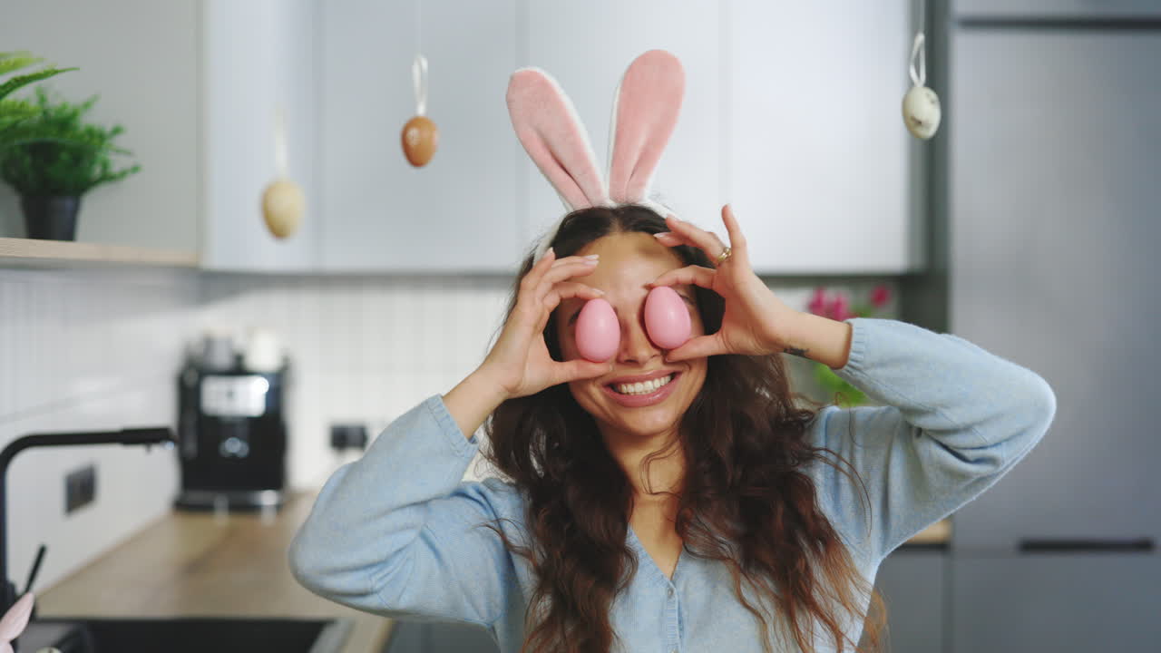 Woman with Easter Bunny Ears and Eggs