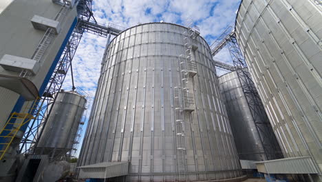 grain elevators outdoors. aluminum containers for storing grain. agribusiness.
