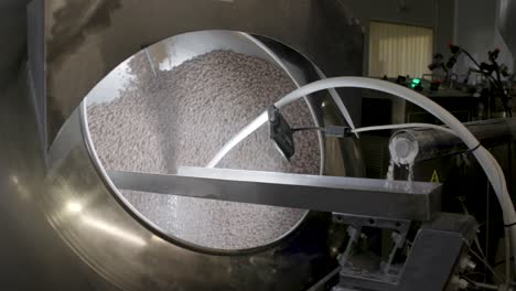 Close-shot-of-a-nuts-seasoning-machine