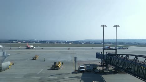 fast airplane departures from runway at stuttgart airport, germany