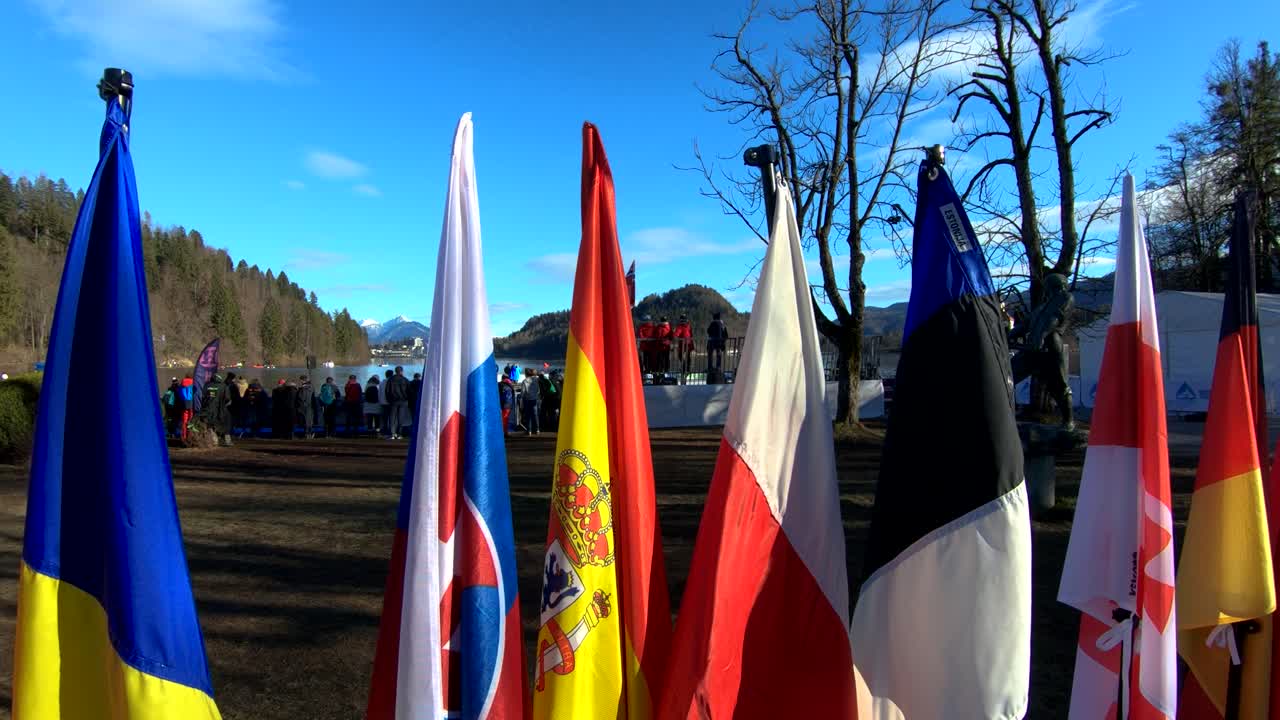 Backward moving flags Winter swimming world championship in lake Bled, Slovenia