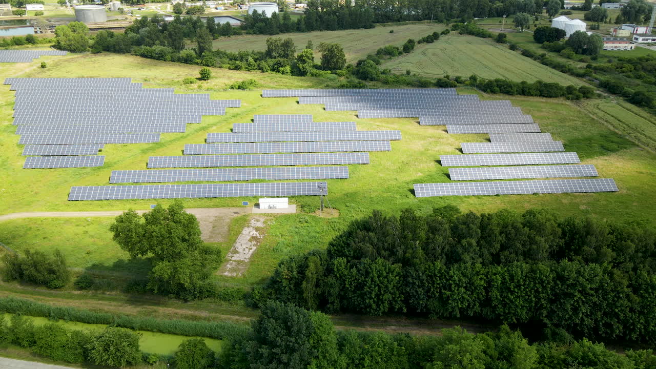 Aerial View Of Solar Panels In Photovoltaic Power Plant Near Gdansk, Poland - drone shot