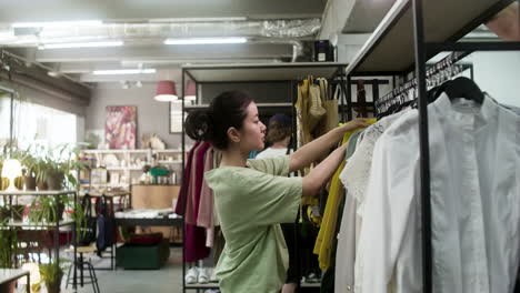 Side-view-of-asian-woman-in-a-store