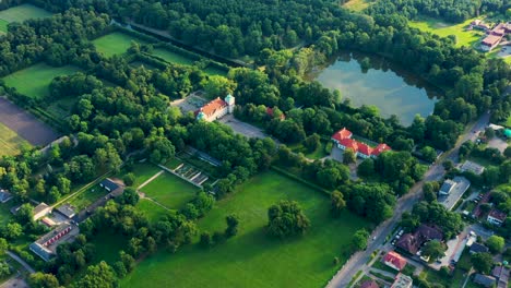 Beautiful-avenue-of-trees-of-Nieborow-Palace,-a-Baroque-style-residence-in-Poland