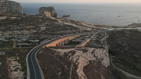 aerial footage bridge and car in gozo