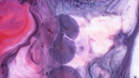arte fluido abstracto con tonos rosados y púrpuras
