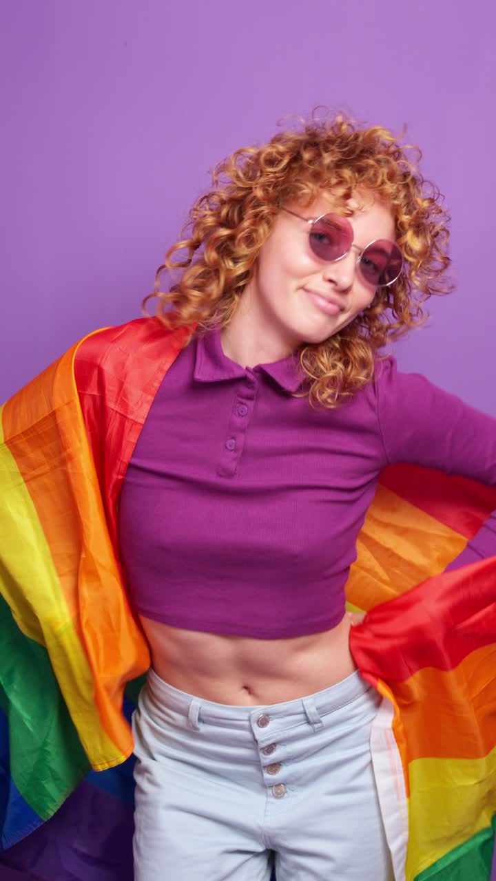 Woman with rainbow flag