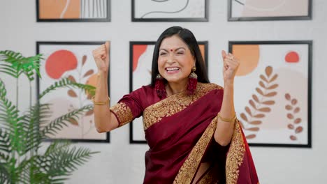 Excited-Indian-woman-cheering