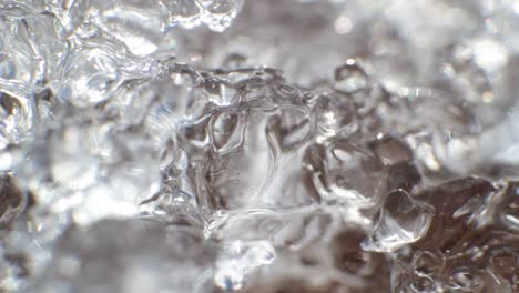 translucent white clear ice surface melting slow with soft focus