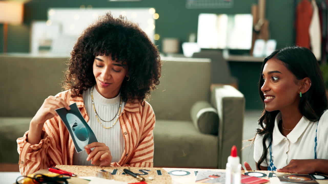 Woman holding a picture of an airplane window while crafting