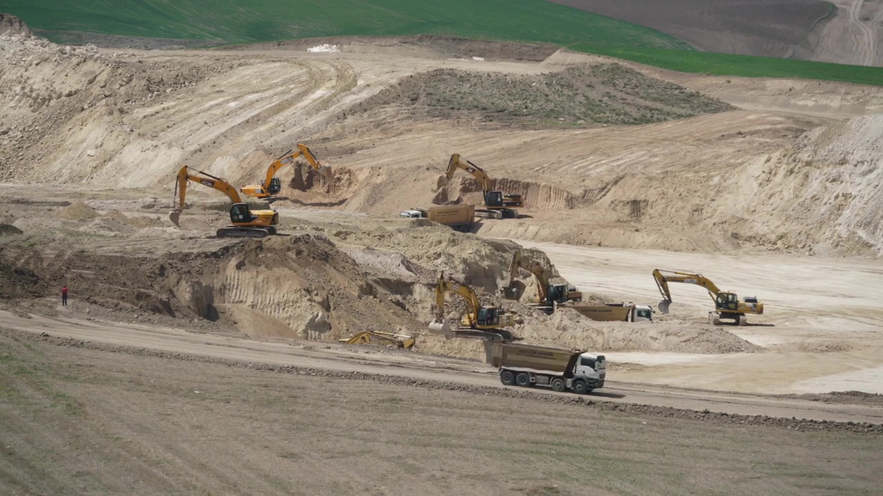 Heavy Machinery Operating at a Large Scale Construction Site