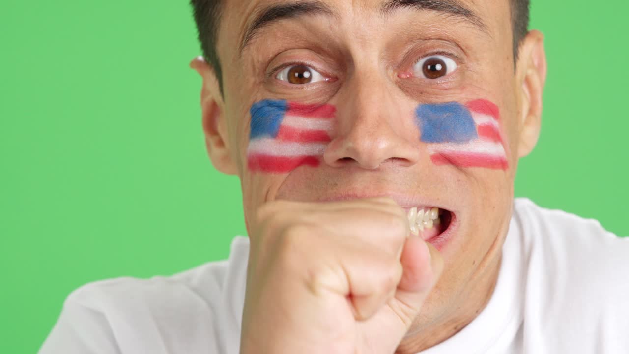 Very nervous man supporting United States team during a difficult match