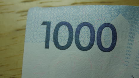 this is the macro view of a normal paper bank not- money- currency of 1000 philippines piso bill