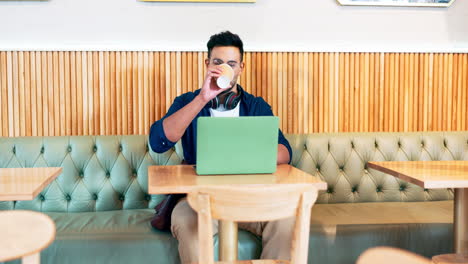 Happy,-man-and-remote-work-in-coffee-shop