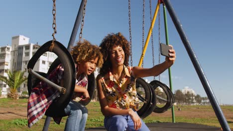 mother and son having fun at playground