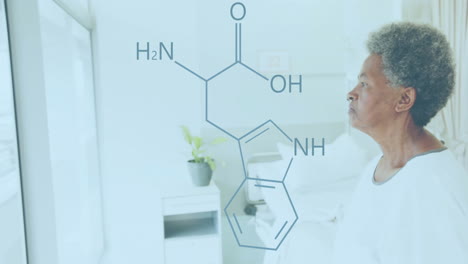 animation of element diagram over happy african american senior female patient in hospital room