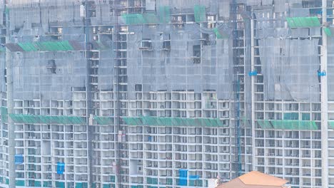 4k.time lapse construction site elevators at work