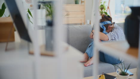 woman browsing internet social media on digital tablet at home