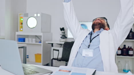 cheerful, excited scientist celebrating