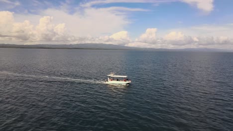 aerial footage of fishing boat sailing at a high speed