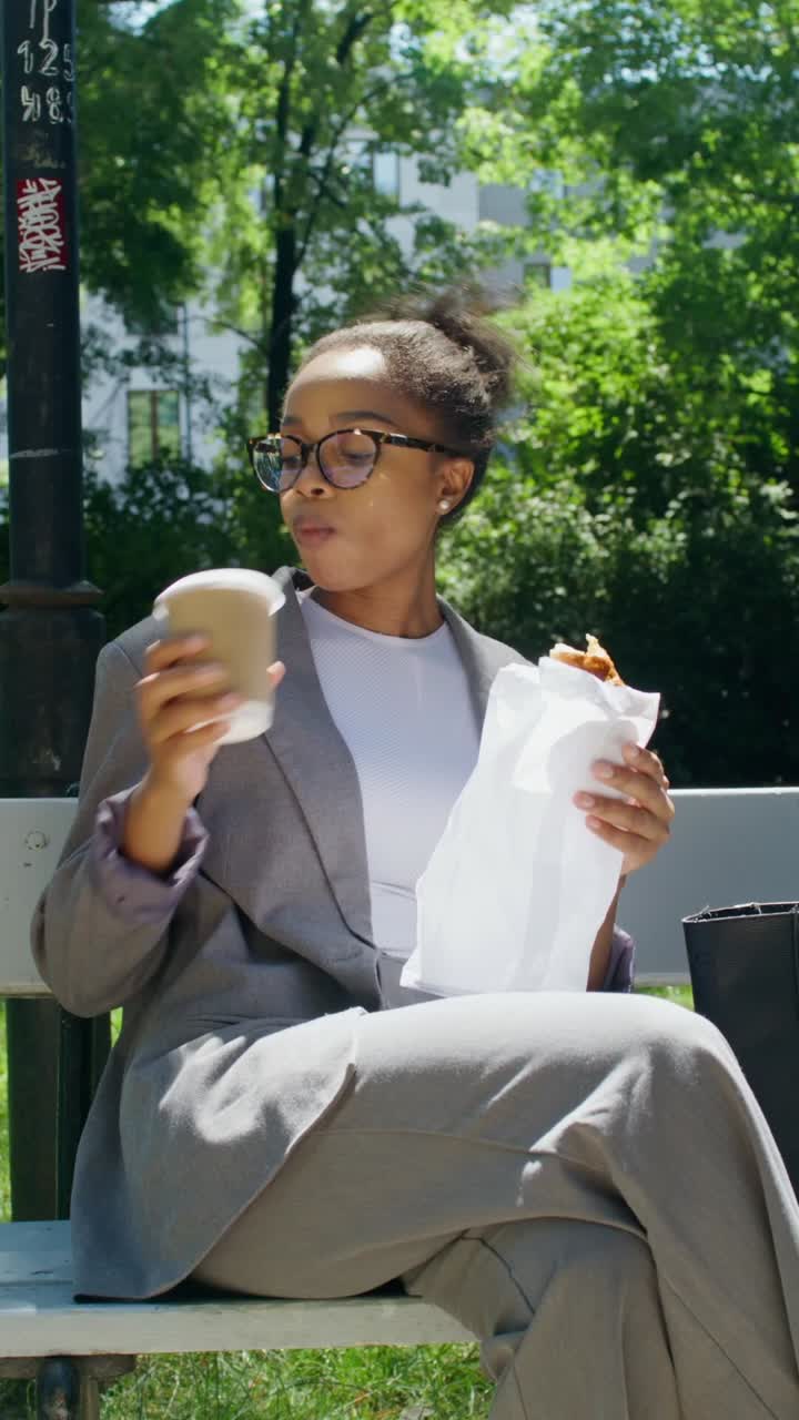 Woman enjoying lunch in a park
