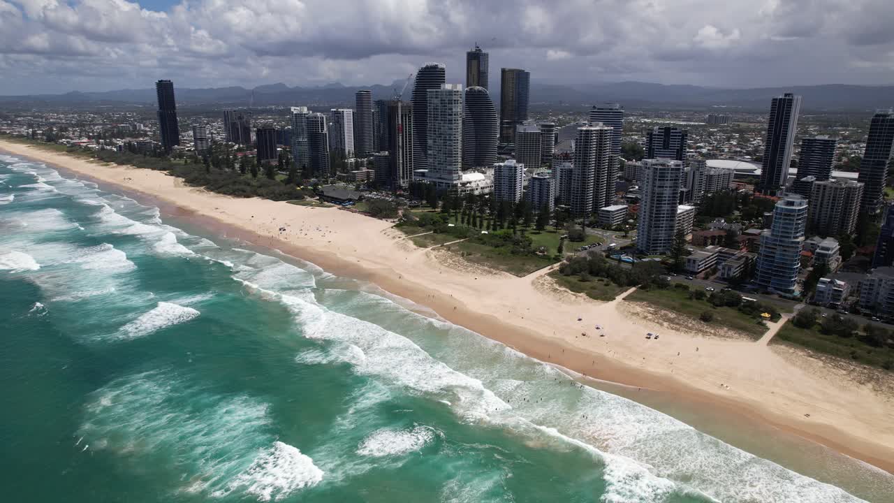 Waterfront Hotels And Beach In Summer In Surfers Paradise, QLD, Australia. - aerial shot